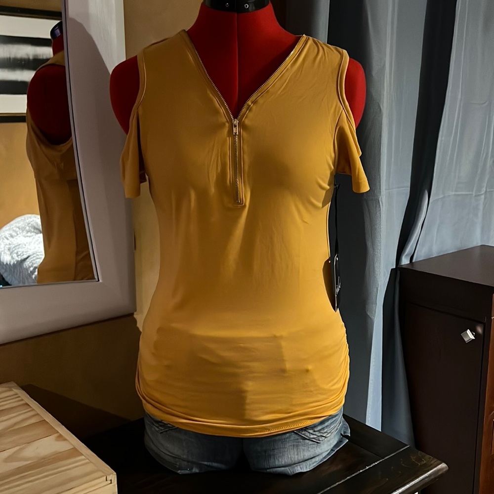 Yellow v-neck zipper front shoulder cut out shirt size large.